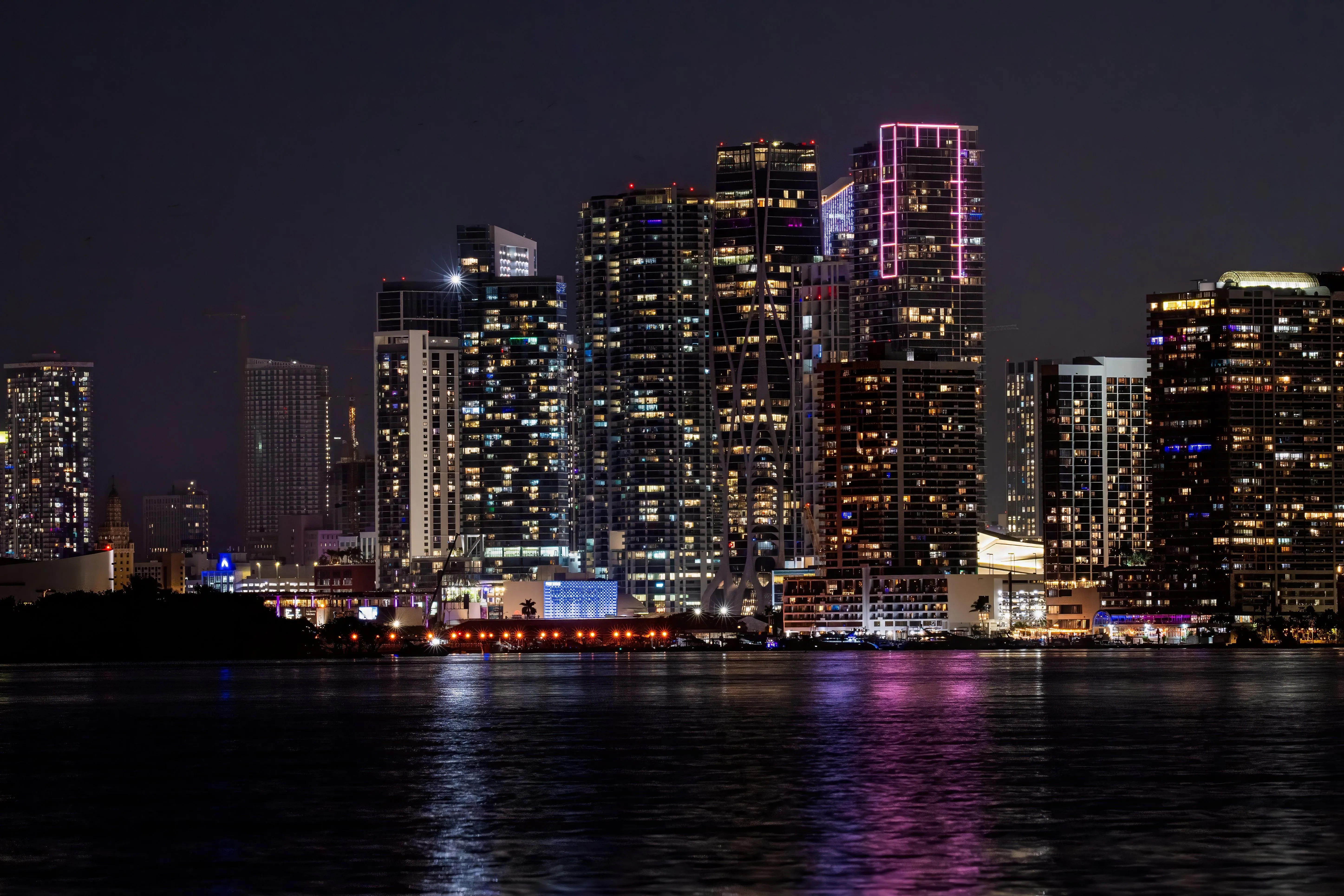 Miami skyline at night, seen across Biscayne Bay